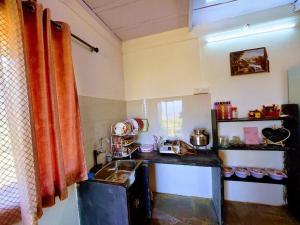 Η κουζίνα ή μικρή κουζίνα στο NeelMohar Bellevue 8