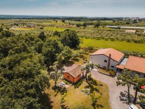 an aerial view of a farm with a house at Apartments Olea in Novigrad Istria