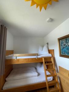 Letto o letti in una camera di Gästehaus Gastl