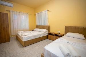 Postel nebo postele na pokoji v ubytování Siesta Hostel - City Center