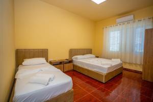 Postel nebo postele na pokoji v ubytování Siesta Hostel - City Center