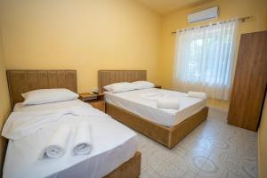 Postel nebo postele na pokoji v ubytování Siesta Hostel - City Center