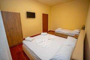 Postel nebo postele na pokoji v ubytování Siesta Hostel - City Center
