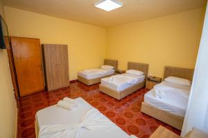Postel nebo postele na pokoji v ubytování Siesta Hostel - City Center