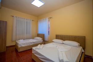 Postel nebo postele na pokoji v ubytování Siesta Hostel - City Center