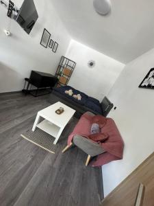 TV a/nebo společenská místnost v ubytování Hobití apartmán - Sam