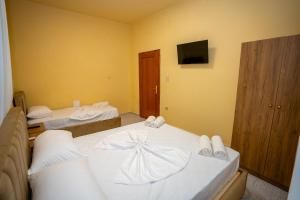 Postel nebo postele na pokoji v ubytování Siesta Hostel - City Center