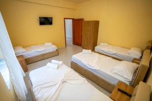 Postel nebo postele na pokoji v ubytování Siesta Hostel - City Center