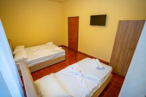 Postel nebo postele na pokoji v ubytování Siesta Hostel - City Center
