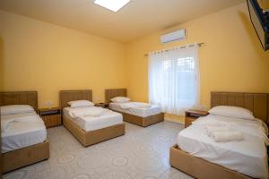 Postel nebo postele na pokoji v ubytování Siesta Hostel - City Center