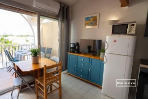 Η κουζίνα ή μικρή κουζίνα στο Appartement climatisé à 100m de la plage