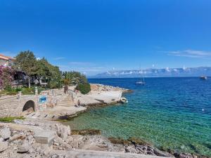 a view of a body of water with a bridge at Apartment Rubin-2 by Interhome in Zastražišće