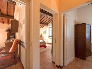 a hallway with a door leading to a room at Apartment Casa Graziani-2 by Interhome in Ravigliano