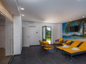 O zonă de relaxare la Holiday Home Villa Visum Mare Unus by Interhome