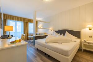 Postel nebo postele na pokoji v ubytování Hotel Funggashof