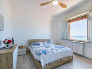 Postel nebo postele na pokoji v ubytování Apartment Francea e Mauro by Interhome