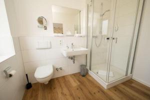 Ein Badezimmer in der Unterkunft Hotel Neumaier