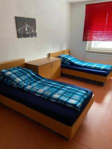 Postel nebo postele na pokoji v ubytování Easyrooms