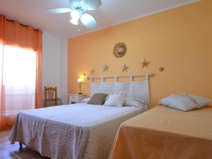 Ένα ή περισσότερα κρεβάτια σε δωμάτιο στο Villa Benifer +33 φωτογραφίες