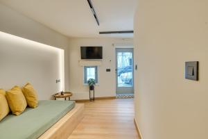 TV a/nebo společenská místnost v ubytování Vittore Gambello Rooms