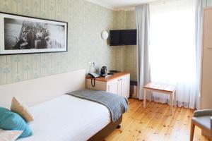 Llit o llits en una habitació de Fosshotel Eastfjords