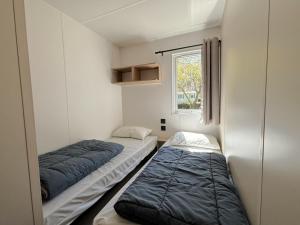 Postel nebo postele na pokoji v ubytování Camping Nature L'Airial + 37 fotografií