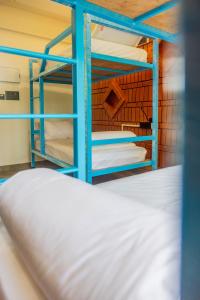 Postel nebo postele na pokoji v ubytování DownTown Hostels - Anjuna