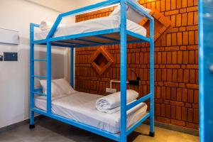 Postel nebo postele na pokoji v ubytování DownTown Hostels - Anjuna