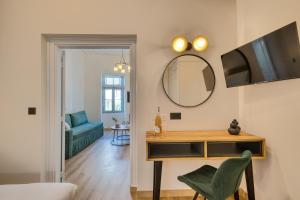TV a/nebo společenská místnost v ubytování Vittore Gambello Rooms