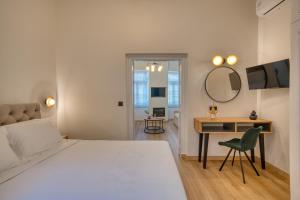 Postel nebo postele na pokoji v ubytování Vittore Gambello Rooms