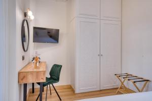 TV a/nebo společenská místnost v ubytování Vittore Gambello Rooms