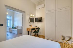 Postel nebo postele na pokoji v ubytování Vittore Gambello Rooms