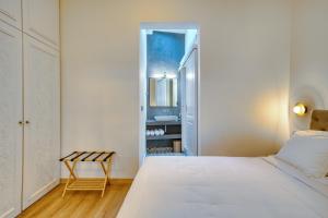 Postel nebo postele na pokoji v ubytování Vittore Gambello Rooms