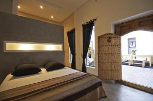 מיטה או מיטות בחדר ב-Riad Kasbah 117