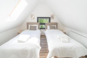 Postel nebo postele na pokoji v ubytování Colakation