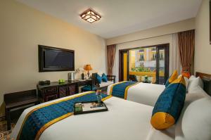 TV a/nebo společenská místnost v ubytování Hanoi Golden Moon Hotel & Travel
