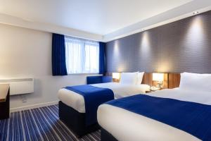 Postel nebo postele na pokoji v ubytování Holiday Inn Express Edinburgh Airport by IHG