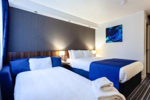 Postel nebo postele na pokoji v ubytování Holiday Inn Express Edinburgh Airport by IHG