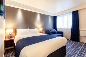 Postel nebo postele na pokoji v ubytování Holiday Inn Express Edinburgh Airport by IHG