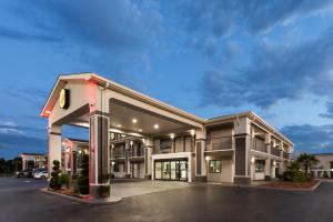 a rendering of a hotel with a parking lot at Super 8 by Wyndham Prattville Montgomery in Prattville