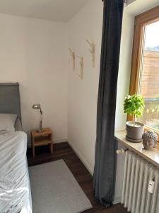 Postel nebo postele na pokoji v ubytování Ferienwohnung Bergrausch