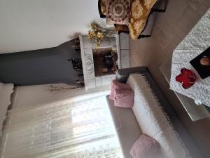 an overhead view of a living room with a couch at Valerias house in Aígio