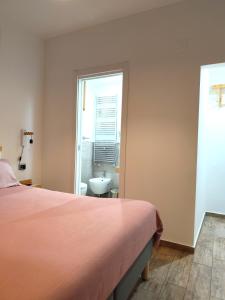 A bed or beds in a room at Forese House