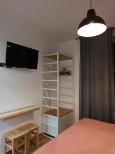 A bed or beds in a room at Forese House