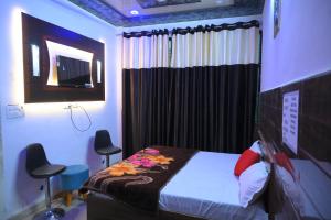Postel nebo postele na pokoji v ubytování Hotel Starlight