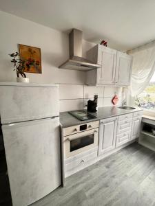 Køkken eller tekøkken på Unterkunft am Rotweinwanderweg + 6 billeder