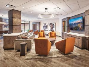 a lobby with couches and chairs in a building at Clarendon 1BR WD Concierge Gym nr WF WDC-518 in Arlington