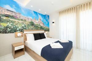 Cama o camas de una habitación en Ivory Suite Seafront With Views!- Fl 14 By Homely