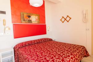 Postel nebo postele na pokoji v ubytování Hotel Teti