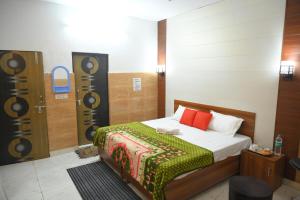 Postel nebo postele na pokoji v ubytování Hotel Starlight